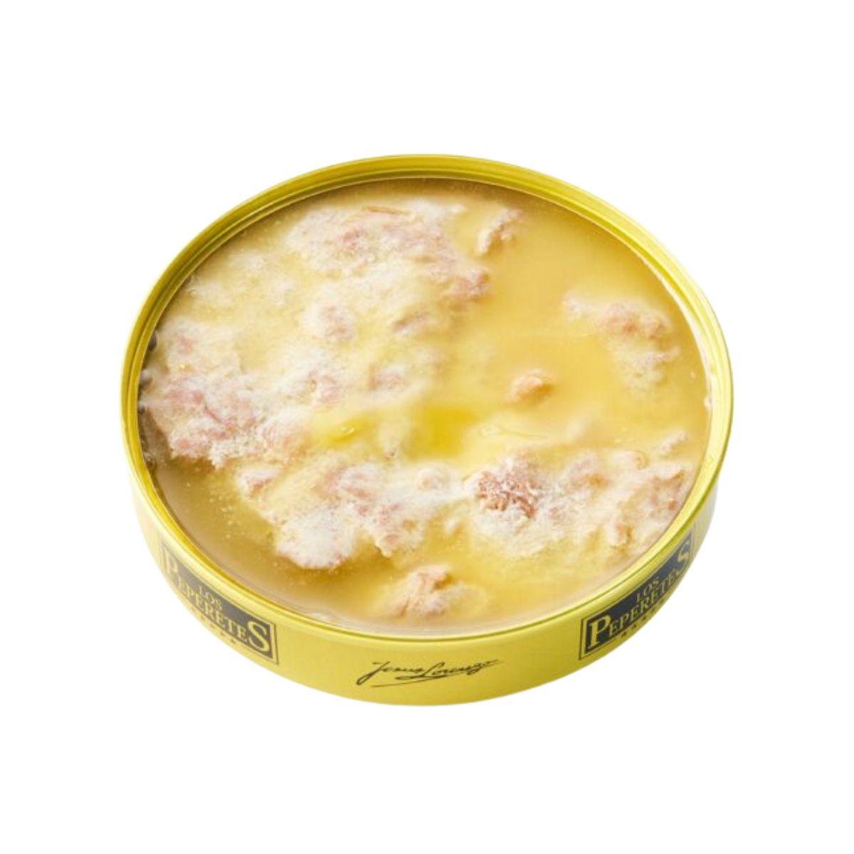 Textura sedosa de la mantequilla fundida visible al comprar ventresca atun rojo mantequilla los peperetes.